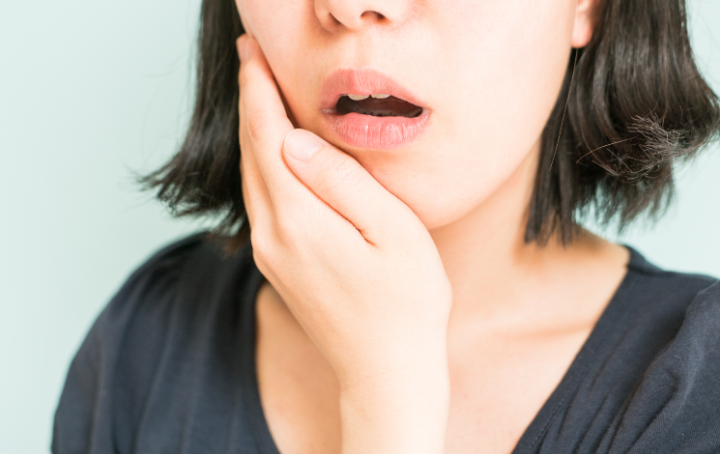 虫歯になった女性